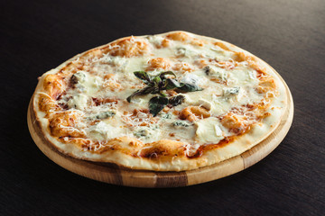 Italian pizza 4 cheese on the Board
