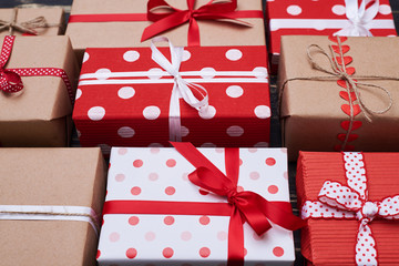 Obraz premium Hand designed wrapped gift boxes placed on the flat layout