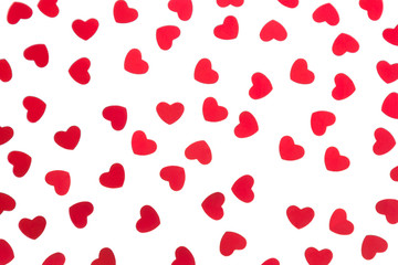 Valentine's day  decorative pattern red hearts confetti isolated on white background. Festive valentine backdrop.