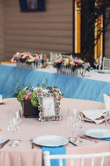 Number 1 put in steel box with flowers stands before bouquet of