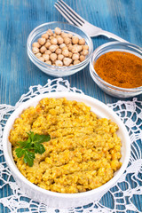 Hummus chickpea puree with curry and saffron