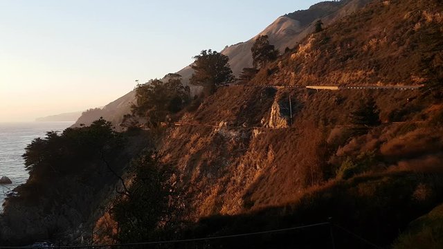Pan view of on mountains, at a sunny november evening, in Big sur, California, United states of america