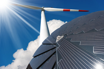 Solar panel and Wind turbine on a blue sky with clouds - Green energy concept