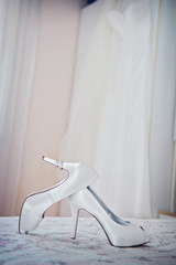 Fototapeta na wymiar White shoe of the Bride . wedding theme background