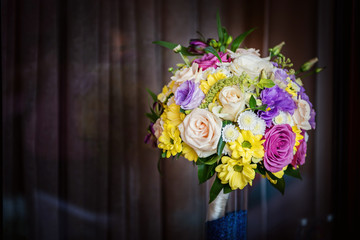 Yellow and pink roses. Wedding bouquet