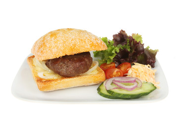 Burger and salad on a plate