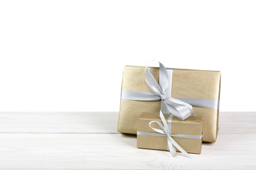 Christmas holiday gift boxes wrapped in paper isolated on white