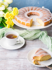 Bundt cake with sugar frosting. Spring breakfast set. Easter festive treat