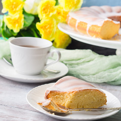 Bundt cake with sugar frosting. Spring breakfast set. Easter festive treat