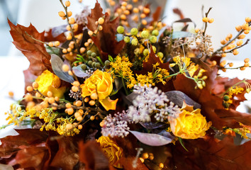 Beautiful stylish autumn bouquet on the table