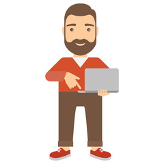 Man with notebook presses button on keyboard.