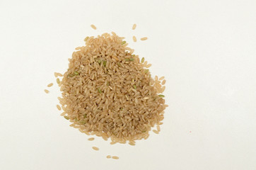 Pile of brown rice on bench