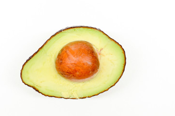 Half of an avocado with seed
