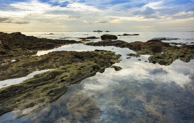 Fototapeta na wymiar rocks in the sea and cloud in sky view in asia