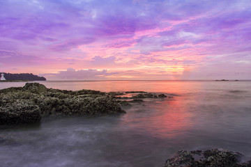 sunset seascapes rock in water beach asia natural view