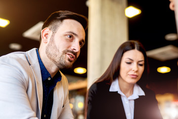 Casual business people having conversation.