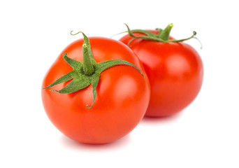Two ripe red tomatoes