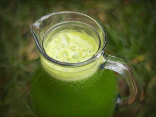 green smoothie in a pitcher
