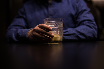 Two cocktail in vintage old fashion glass on the wood table