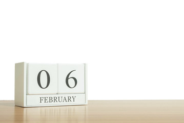 Obraz premium Closeup surface white wooden calendar with black 1 january word
