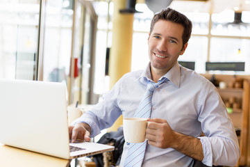 Businessman having a coffee break