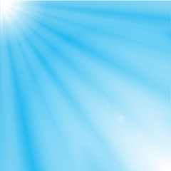 Sun rays on Blue Sky Background 