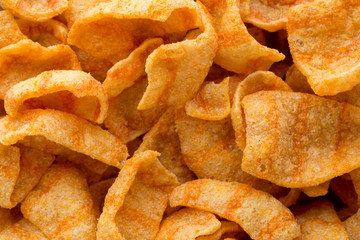 Delicious potato chips closeup becon meat.