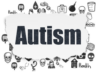 Medicine concept: Autism on Torn Paper background