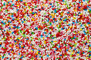 Multicoloured sweet sugar balls. Small ball pattern.