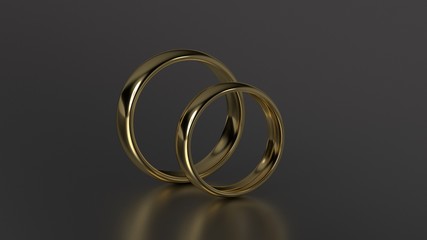 The beauty gold wedding rings on black background. 3d rendering