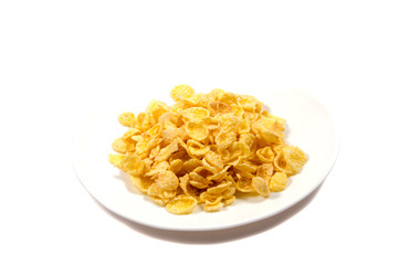Falling flakes breakfast cereal isolated on white background. Healthy breakfast.