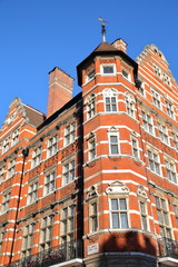 LONDON, UK: Red brick Victorian houses facades in the borough of Westminster