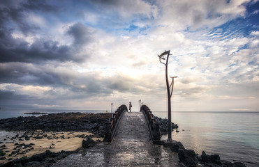 young woman enjoying sunrise view