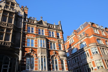 LONDON, UK: Red brick Victorian houses facades in the borough of Westminster