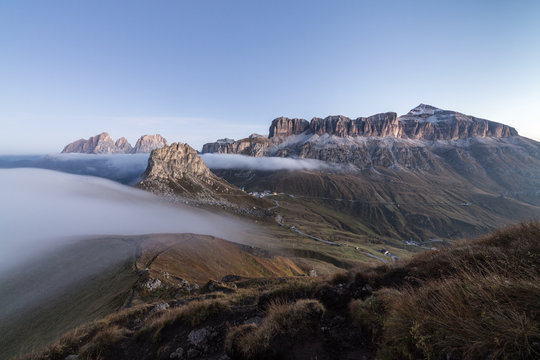 Piz Boa Sassolungo and Sass Beca shrouded in morning fog Cima Belvedere, Canazei, Val di Fassa, Trentino-Alto Adige