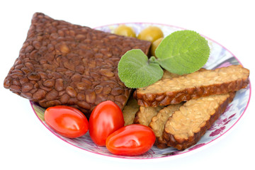 Fresh tempeh on a saucer