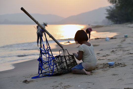 childhood ,Family fishing on the beach Thailand.