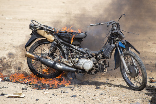 flame burned motorcycle from explosive in forensic training