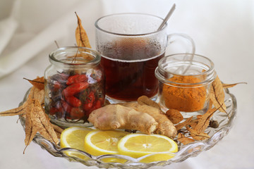  lime broth with honey, lemon and ginger on the glasss vase