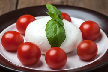 Mozzarella, tomato and basil.