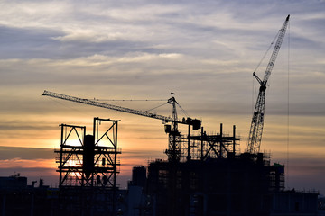 silhouette construction site .