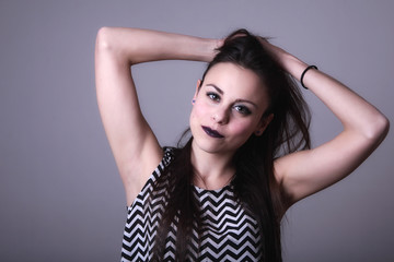 Fototapeta premium Fashion portrait of beautiful young woman