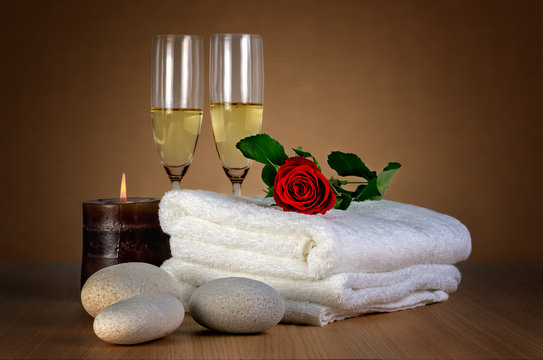 Love spa /
Romantic spa decoration with candle, spa stones, rose and champagn