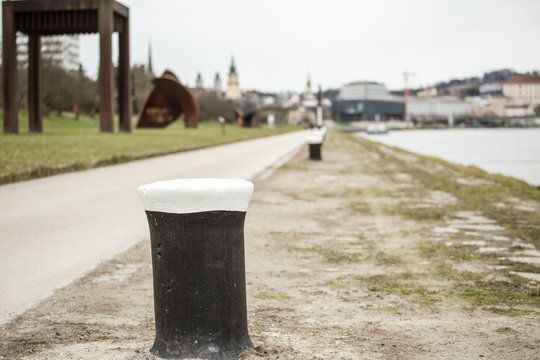 poller and quay at river Danube in Linz