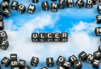 The word Ulcer on the sky background