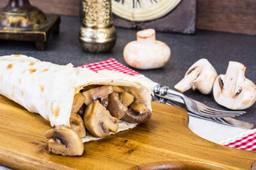 Roll pita and grilled mushrooms