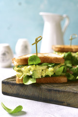 Sandwich with egg avocado salad. © lilechka75