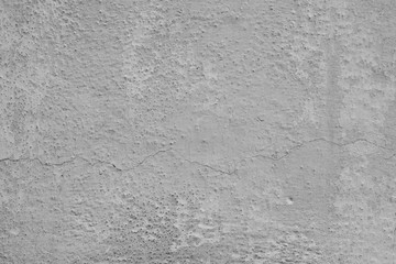 Wall fragment with scratches and cracks