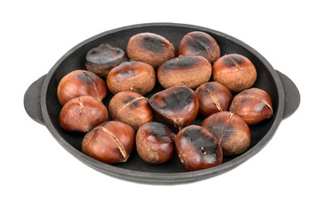 Roasted chestnuts in pan
