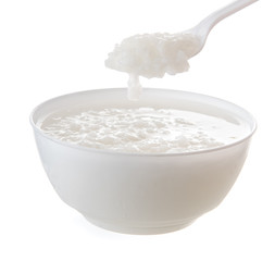 Mush or boiled rice in bowl isolated on white background